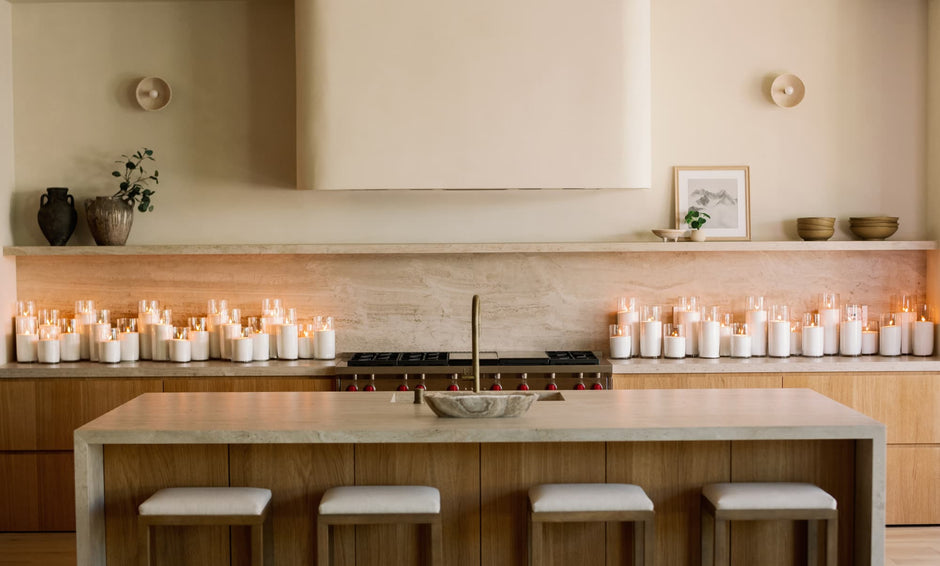 Wide candlelit tablescape with warm ambient glow